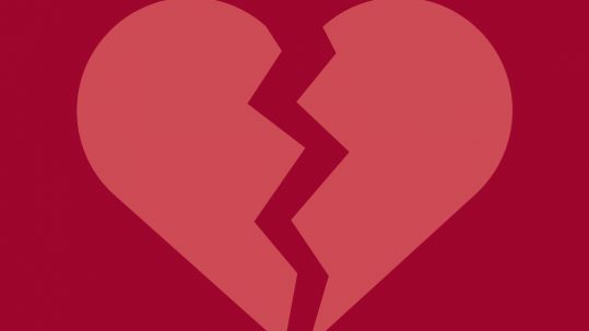 a pink broken heart on a dark pink background